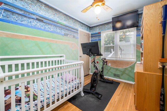 3458 Frederick St, Oceanside, NY 11572 - bedroom featuring wallpapered walls and hardwood / wood-style flooring