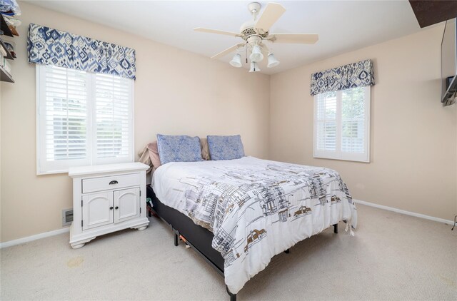 3458 Frederick St, Oceanside, NY 11572 - bedroom featuring light carpet and ceiling fan