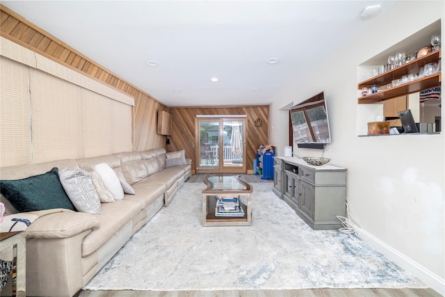 3458 Frederick St, Oceanside, NY 11572 - living area with baseboards and wooden walls