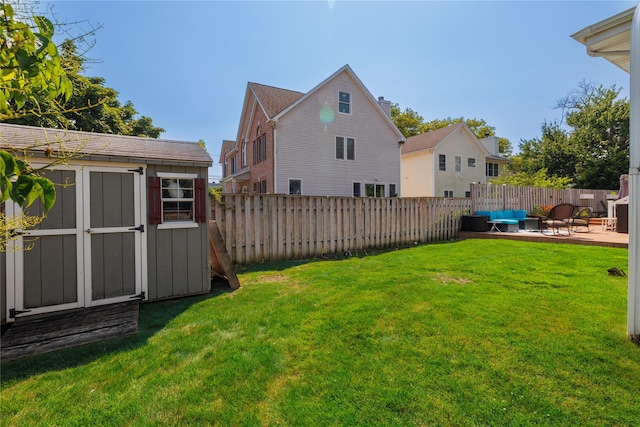 3458 Frederick St, Oceanside, NY 11572 - fenced backyard with outdoor lounge area, a shed, and a patio area