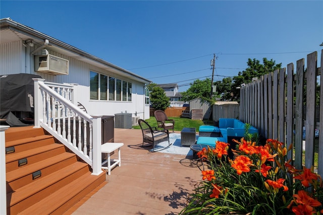 3458 Frederick St, Oceanside, NY 11572 - fenced backyard with outdoor lounge area, stairway, and a deck