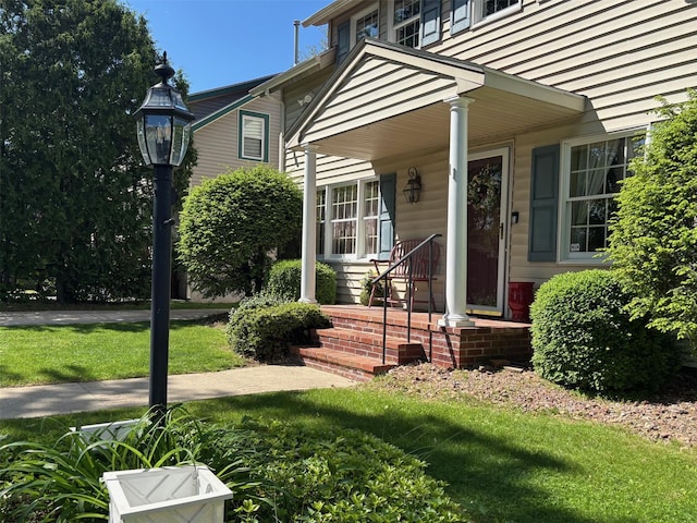 11 Berry St, Wallkill, NY 12589 - property entrance with a lawn