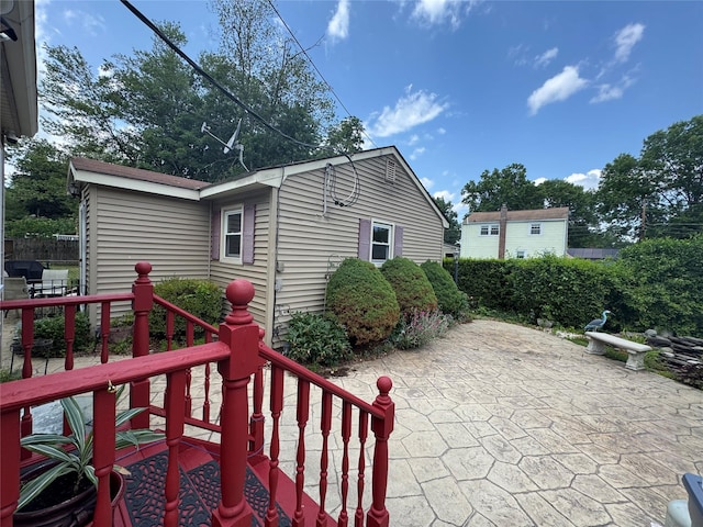 11 Berry St, Wallkill, NY 12589 - view of property exterior featuring a patio area