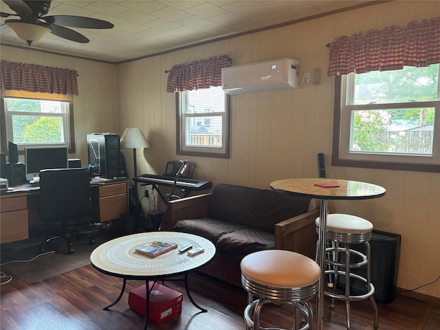 11 Berry St, Wallkill, NY 12589 - office area with a wall unit AC, wood finished floors, ceiling fan, and crown molding