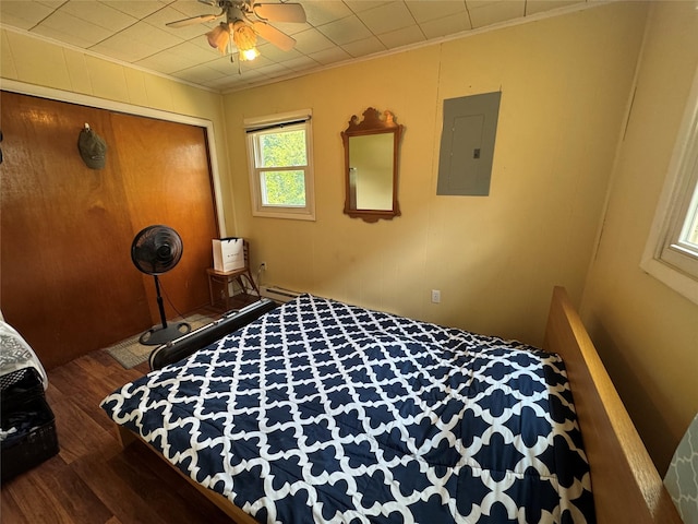 11 Berry St, Wallkill, NY 12589 - bedroom featuring electric panel, wood finished floors, crown molding, a closet, and a ceiling fan