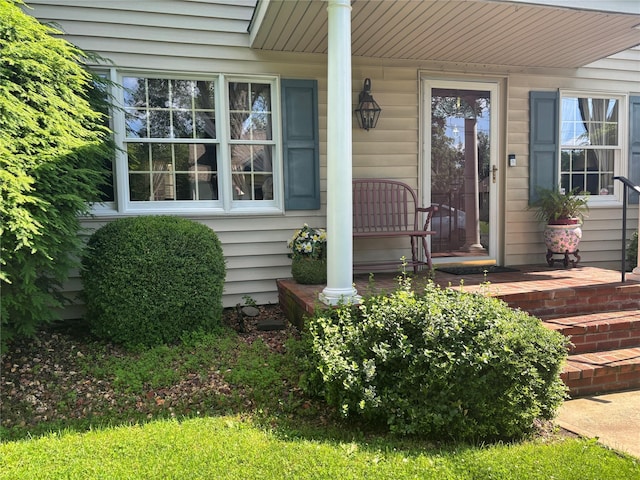 11 Berry St, Wallkill, NY 12589 - view of exterior entry with a porch