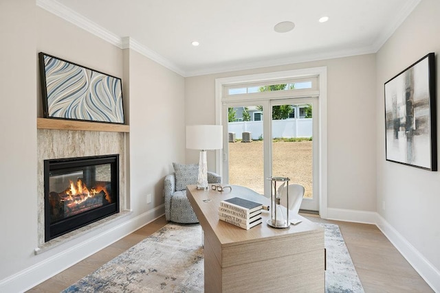 46 Plainview Rd, Woodbury, NY 11797 - home office with wood finished floors, a glass covered fireplace, ornamental molding, and recessed lighting