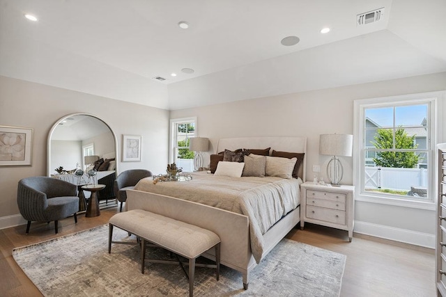 46 Plainview Rd, Woodbury, NY 11797 - bedroom with wood finished floors, lofted ceiling, and recessed lighting