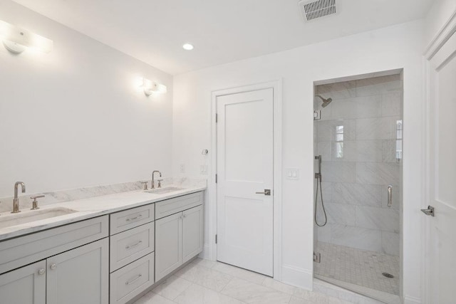 46 Plainview Rd, Woodbury, NY 11797 - bathroom with a stall shower, marble look tiles, double vanity, and recessed lighting