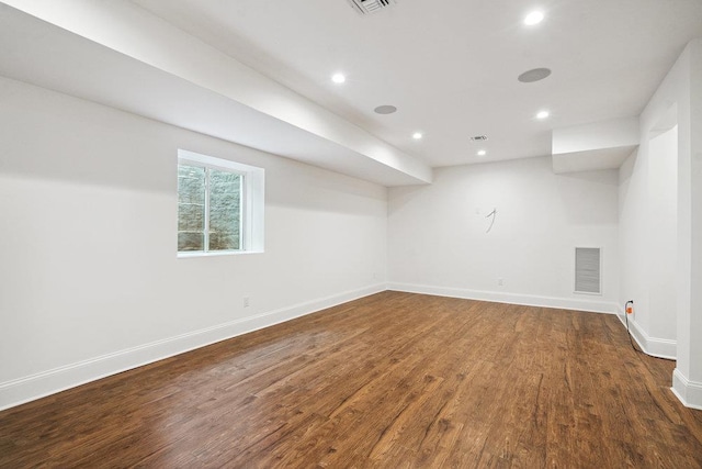 46 Plainview Rd, Woodbury, NY 11797 - below grade area featuring wood finished floors and recessed lighting