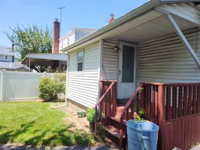 14 W Argyle St, Valley Stream, NY 11580 - property entrance featuring a chimney and a deck