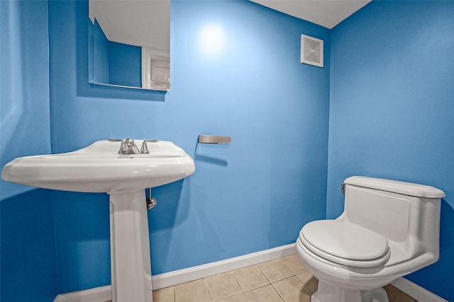 8624 253rd St, Bellerose, NY 11426 - bathroom featuring toilet and tile patterned flooring