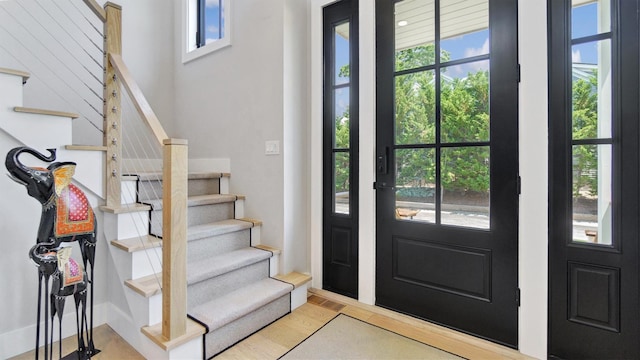 305 Fay Ct, Mattituck, NY 11952 - entryway with stairway and wood finished floors
