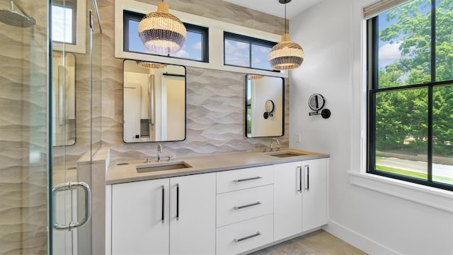 305 Fay Ct, Mattituck, NY 11952 - full bathroom featuring plenty of natural light, tasteful backsplash, and a shower stall