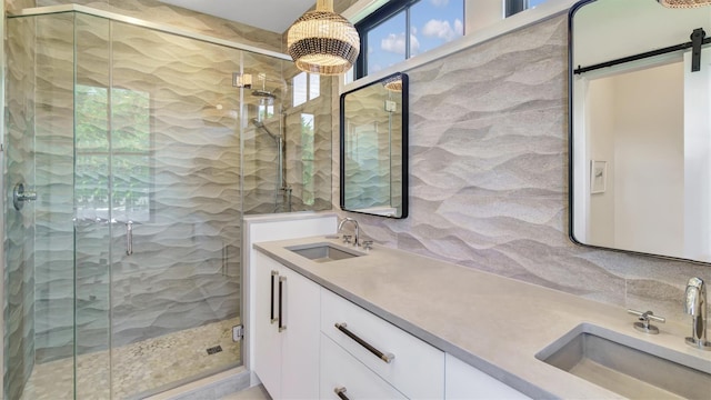305 Fay Ct, Mattituck, NY 11952 - full bathroom featuring double vanity, a shower stall, and decorative backsplash