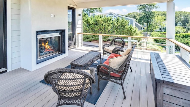 305 Fay Ct, Mattituck, NY 11952 - deck with an outdoor living space with a fireplace