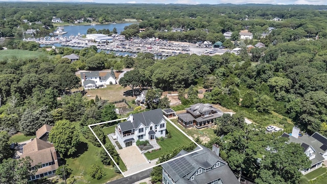305 Fay Ct, Mattituck, NY 11952 - aerial view of property and surrounding area featuring a nearby body of water, property parcel outlined, and a marina