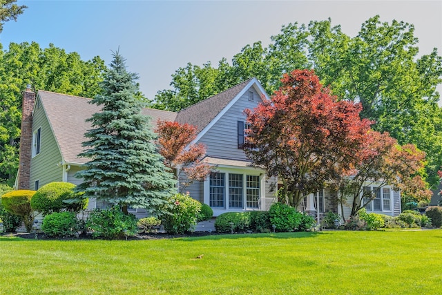 2 White Pine Ln, Setauket, NY 11733 - view of property hidden behind natural elements with a front yard