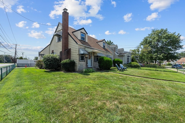 1 Horton Rd, Valley Stream, NY 11581 - view of side of home featuring a chimney