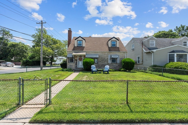 1 Horton Rd, Valley Stream, NY 11581 - cape cod house with a gate and a chimney