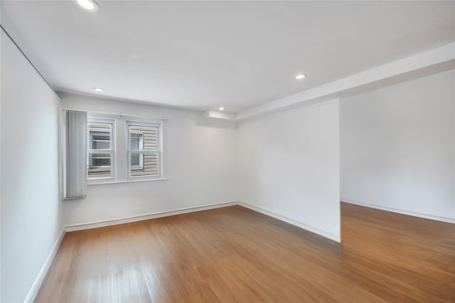 12605 109th Ave, Richmond Hill S, NY 11420 - empty room with wood finished floors and recessed lighting