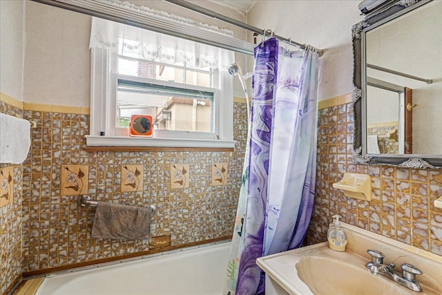 16608 Cryders Ln, Beechhurst, NY 11357 - bathroom with tile walls, shower / bathtub combination with curtain, and vanity