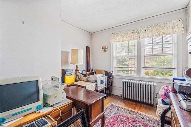16608 Cryders Ln, Beechhurst, NY 11357 - home office featuring radiator heating unit and wood finished floors