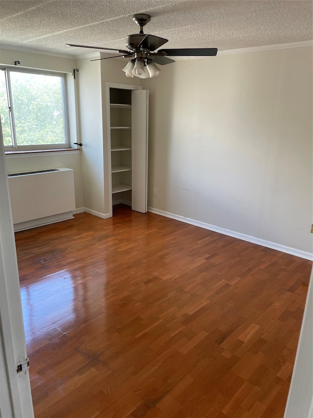 3220 Fairfield Ave Unit 6D, Bronx, NY 10463 - unfurnished bedroom with a textured ceiling, wood finished floors, crown molding, ceiling fan, and a closet
