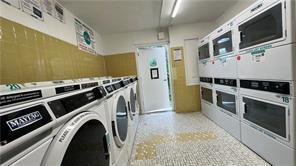 26 Cooper Unit 314, Poughkeepsie, NY 12603 - community laundry featuring stacked washer / dryer and washing machine and clothes dryer