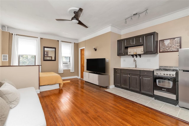 160-15 Powells Cove Blvd Unit A1, Whitestone, NY 11357 - living area with a ceiling fan, light wood-type flooring, and crown molding