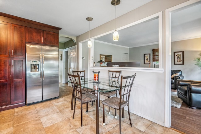 1334 Thompson Dr, Bay Shore, NY 11706 - dining room featuring crown molding and arched walkways