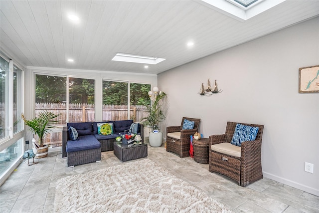 1334 Thompson Dr, Bay Shore, NY 11706 - sunroom with a skylight, wooden ceiling, and recessed lighting
