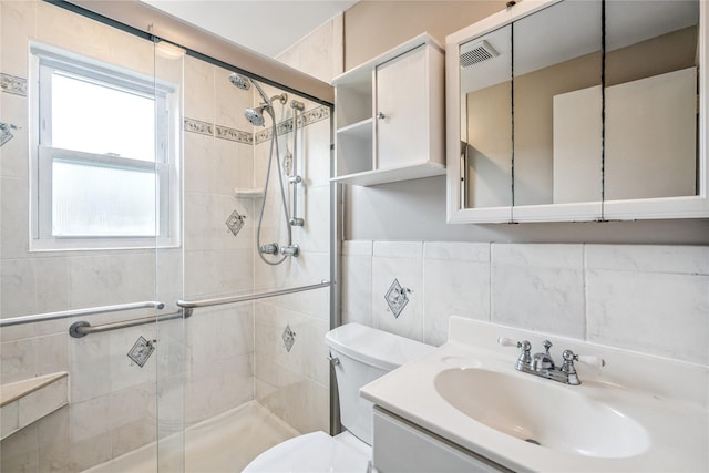 1334 Thompson Dr, Bay Shore, NY 11706 - full bathroom featuring a shower stall, tile walls, and vanity