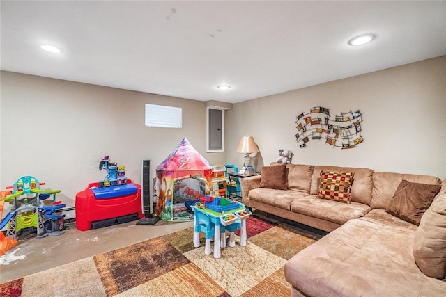 1334 Thompson Dr, Bay Shore, NY 11706 - living area featuring electric panel, recessed lighting, and concrete flooring
