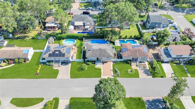 318 Claremont Ave, West Babylon, NY 11704 - aerial perspective of suburban area with a pool