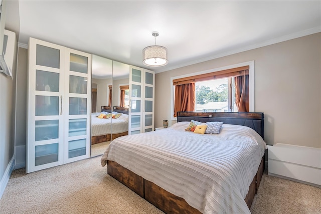 318 Claremont Ave, West Babylon, NY 11704 - carpeted bedroom featuring ornamental molding and baseboards