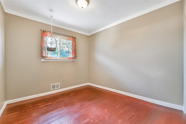 318 Claremont Ave, West Babylon, NY 11704 - empty room with wood finished floors and ornamental molding