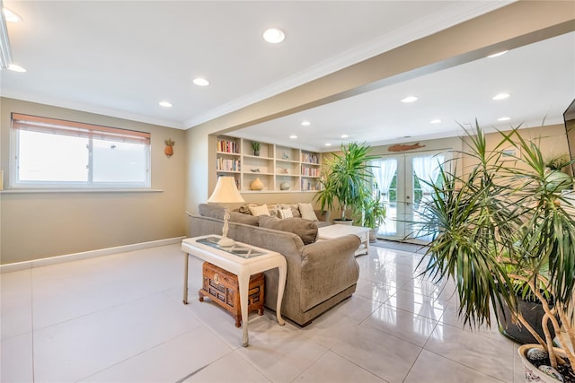 318 Claremont Ave, West Babylon, NY 11704 - living room with healthy amount of natural light, french doors, recessed lighting, ornamental molding, and light tile patterned floors