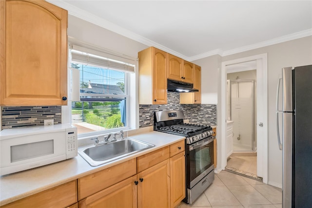 318 Claremont Ave, West Babylon, NY 11704 - kitchen with stainless steel appliances, under cabinet range hood, light tile patterned floors, ornamental molding, and light countertops