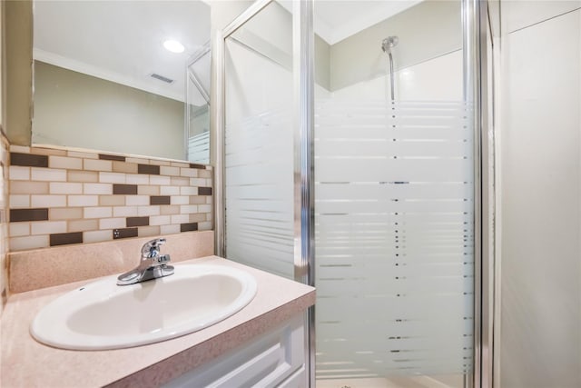 318 Claremont Ave, West Babylon, NY 11704 - full bathroom featuring decorative backsplash, vanity, a stall shower, ornamental molding, and recessed lighting
