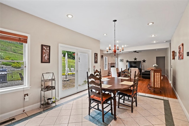 8 Hamlet Way, Hopewell Junction, NY 12533 - dining area featuring a chandelier, light tile patterned flooring, recessed lighting, and inlaid floor details