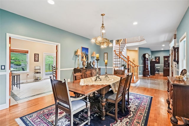 8 Hamlet Way, Hopewell Junction, NY 12533 - dining area featuring stairs, a chandelier, wood finished floors, and recessed lighting