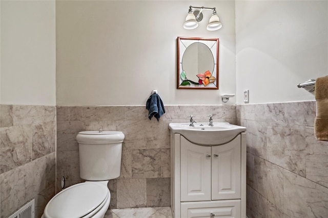 8 Hamlet Way, Hopewell Junction, NY 12533 - bathroom with vanity, tile walls, and a wainscoted wall