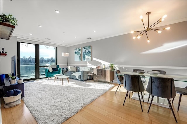 701 Rdg Hill Blvd Unit 10B, Yonkers, NY 10710 - living room with ornamental molding, a chandelier, light wood-type flooring, and recessed lighting