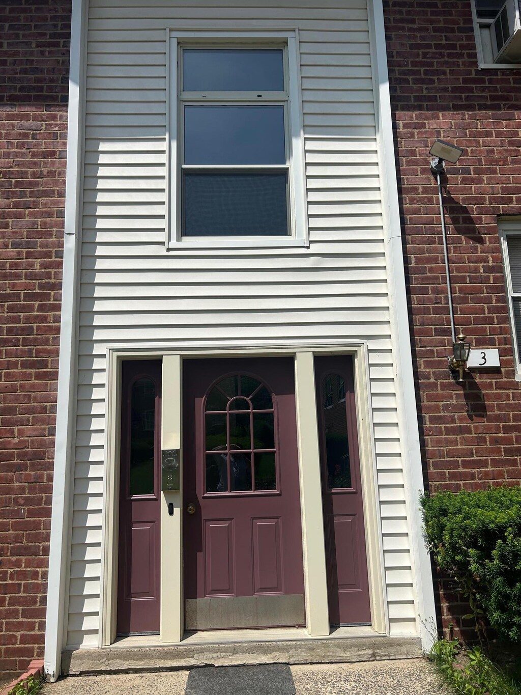 3 Cascade Ter Unit 1E, Yonkers, NY 10703 - property entrance with brick siding
