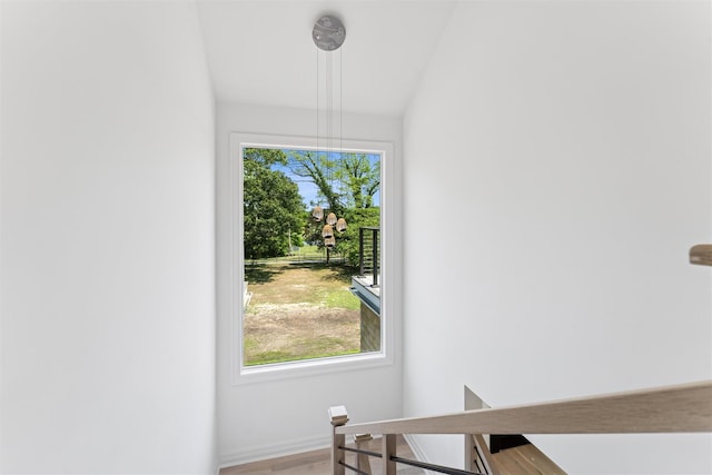 135 S Rd, Westhampton, NY 11977 - staircase with baseboards and wood finished floors