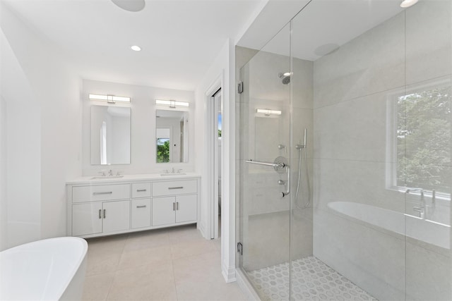 135 S Rd, Westhampton, NY 11977 - full bath featuring a stall shower, a soaking tub, double vanity, tile patterned flooring, and recessed lighting