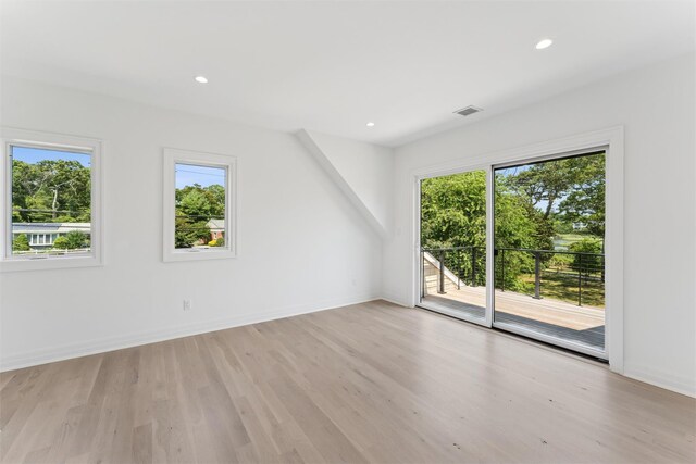 135 S Rd, Westhampton, NY 11977 - spare room featuring healthy amount of natural light, light wood-type flooring, and recessed lighting