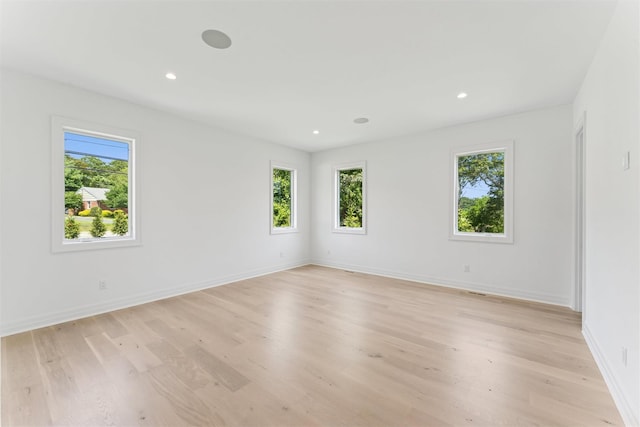 135 S Rd, Westhampton, NY 11977 - empty room with light wood-style floors and recessed lighting
