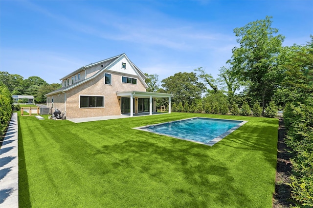 135 S Rd, Westhampton, NY 11977 - back of property with a patio area and an outdoor pool